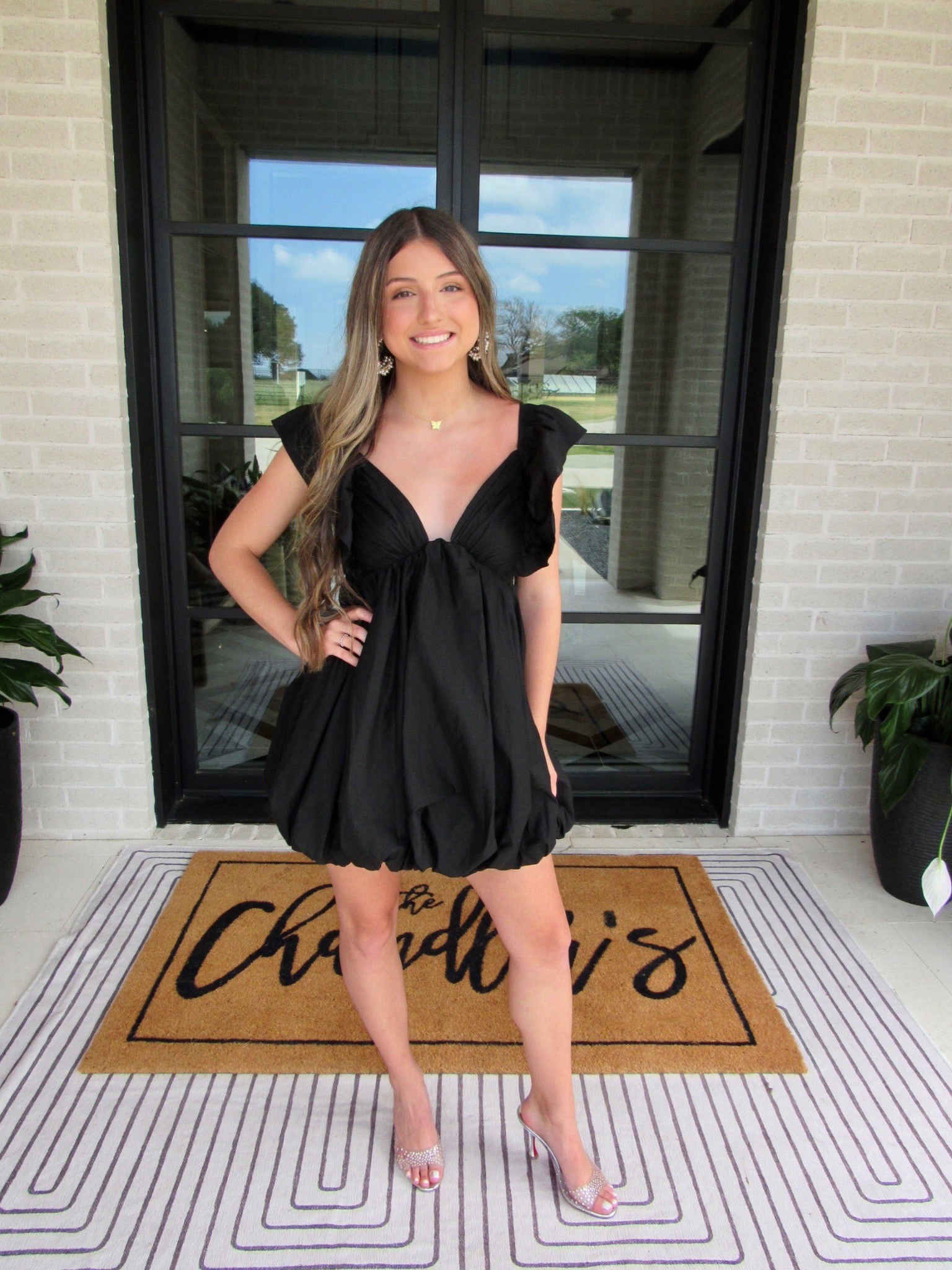 woman wearing black bubble dress 