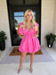 woman wearing pink bubble dress 