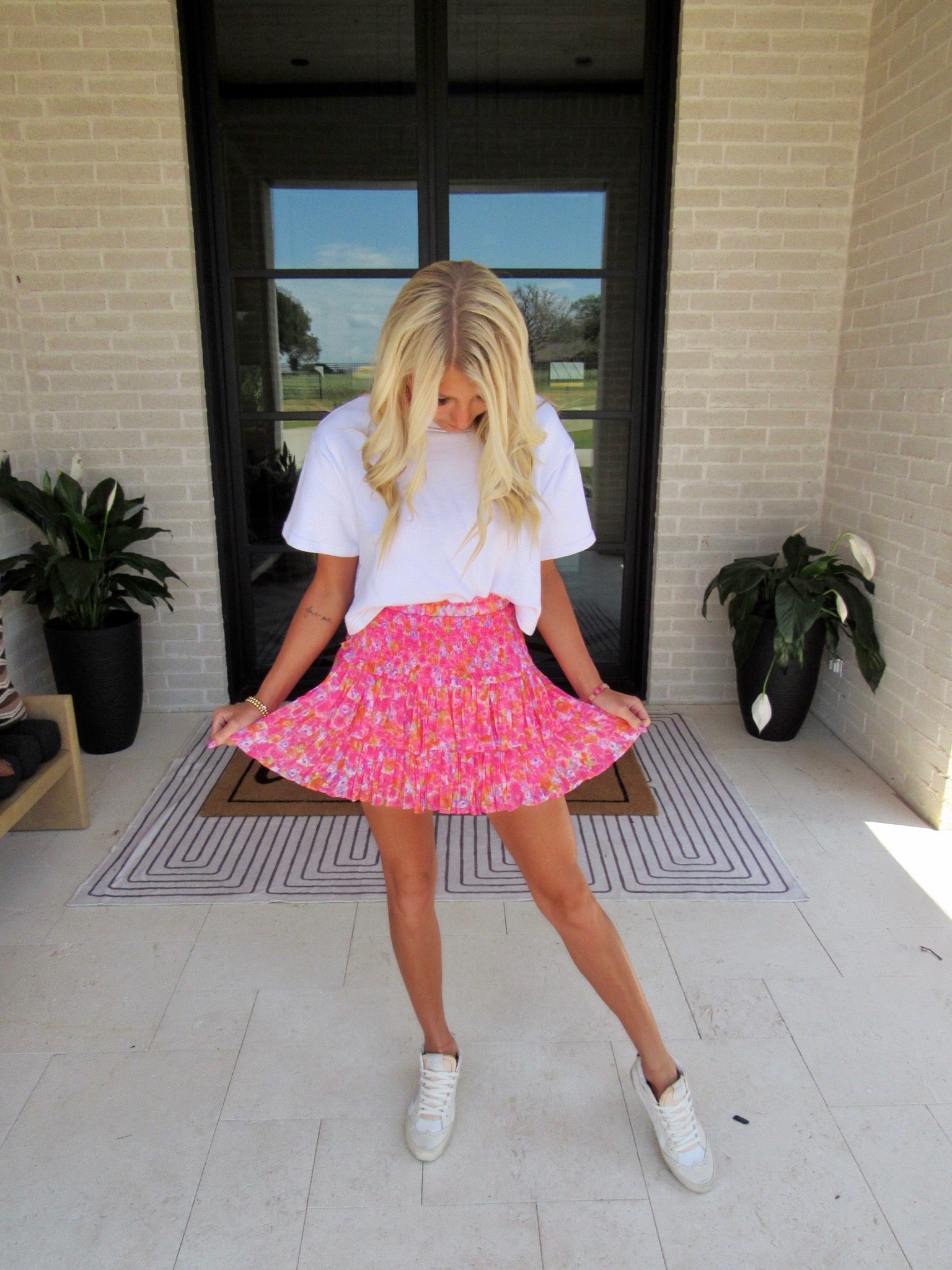 woman wearing pink scrushin' skirt 