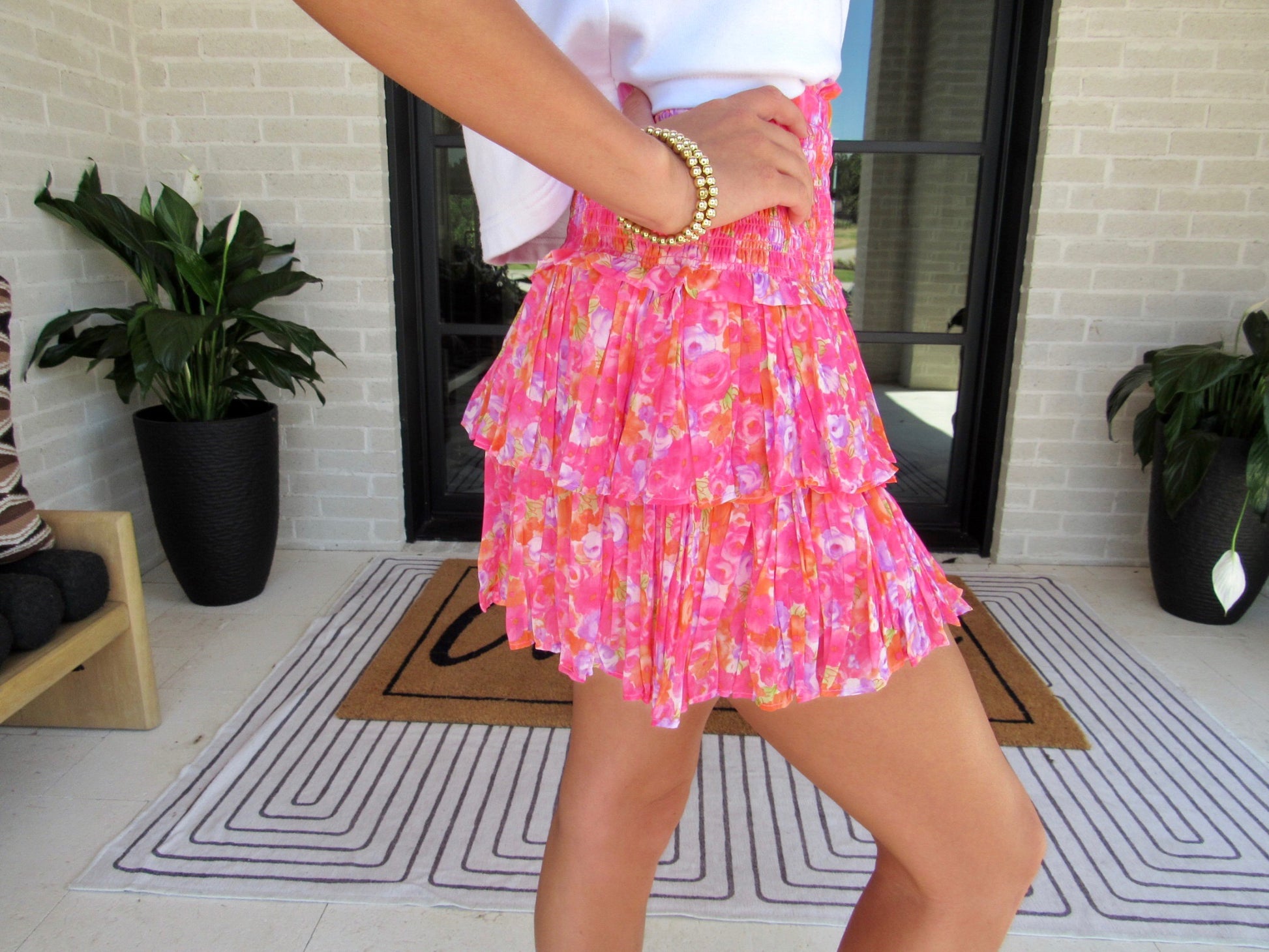 woman wearing pink scrushin' skirt close up different pose