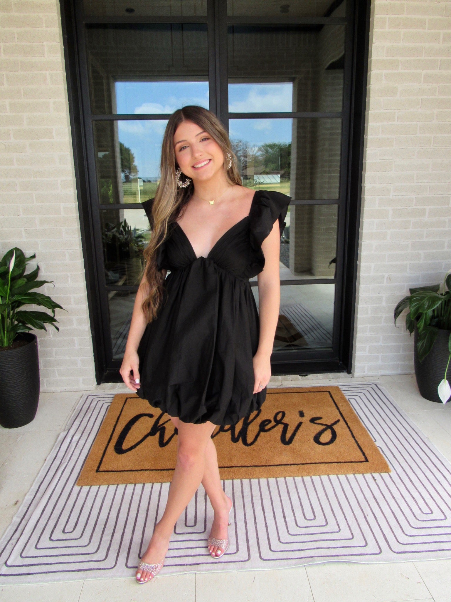 woman wearing black bubble dress 